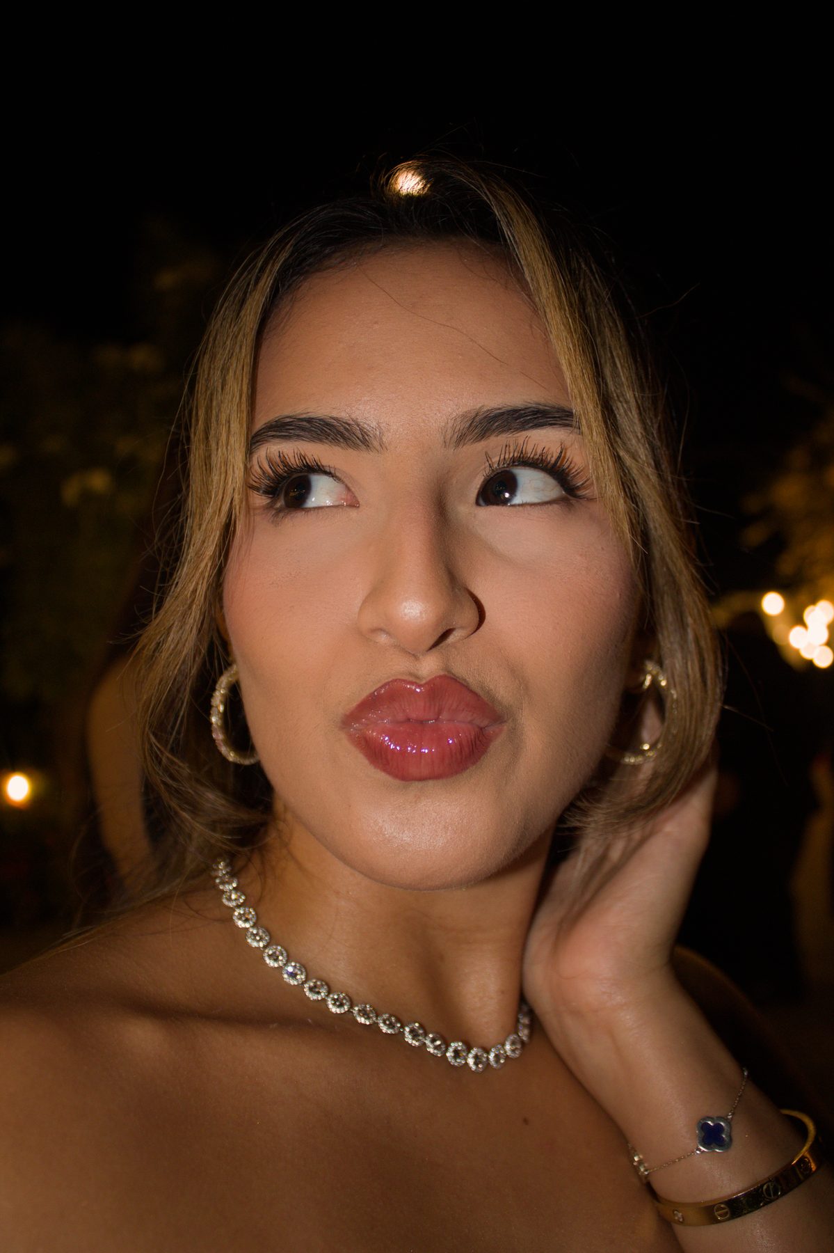 Portrait of a wedding guest with a playful expression