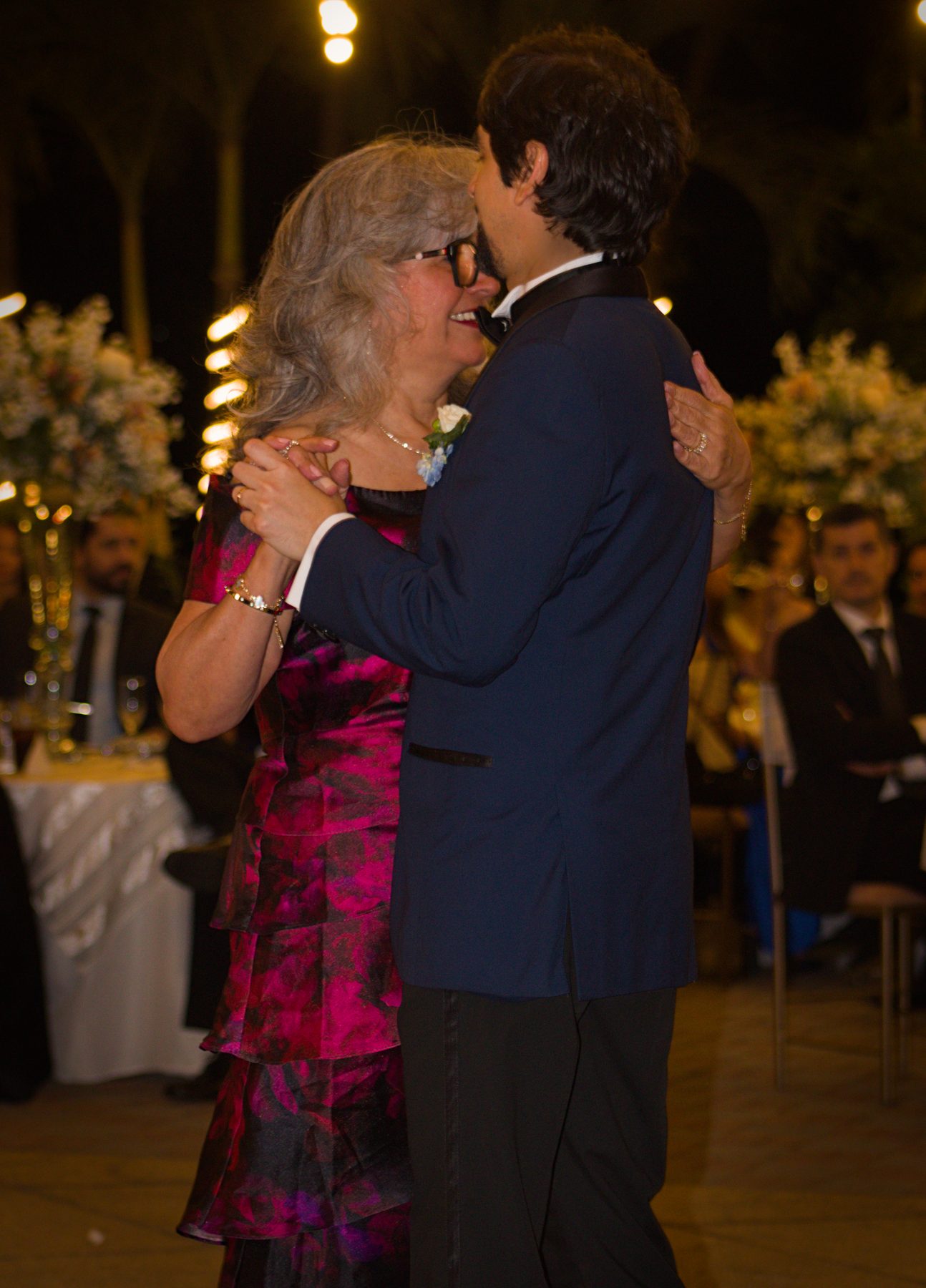 Groom dancing with his mother at the reception